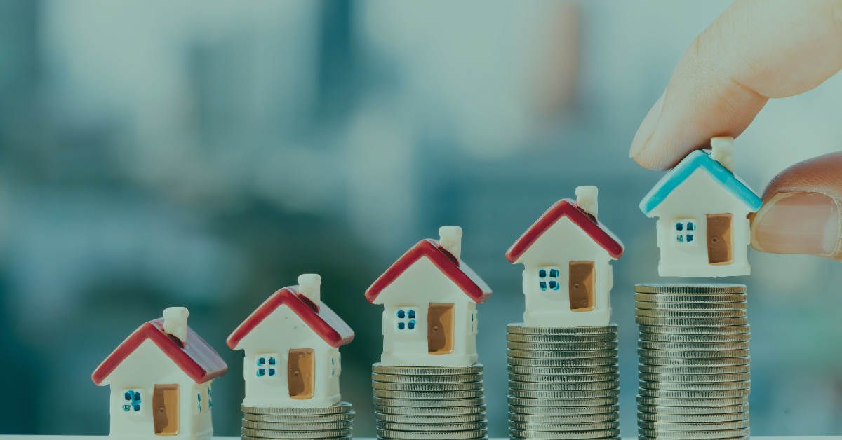 Mini Houses and Stacks of Coins - An illustrative image featuring four mini houses stacked on increasingly tall stacks of coins, representing the financial aspects of distressed properties.